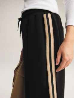 Zwart/neutraal - Slinky trainingsbroek met wijde pijpen en zijstrepen
