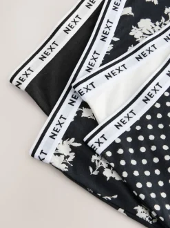 Zwart/wit met bloemenprint - 4 Katoenen slipjes met logotailleband