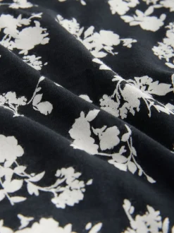 Zwart/wit met bloemenprint - 4 Katoenen slipjes met logotailleband