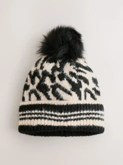 Zwart/wit met dierenprint - Gebreide muts met pompon
