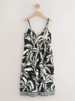 Zwart/wit met palmboomprint - Halflange jersey jurk met knoopsluiting