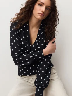 Zwart-wit met stippen - Blouse met V-hals en lange mouwen