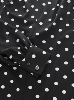 Zwart-wit met stippen - Blouse met V-hals en lange mouwen